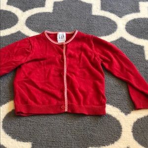 Red cardigan for baby
